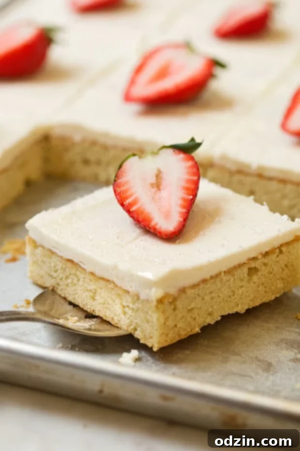 Texas-sized vanilla sheet cake with cream cheese frosting - a simple vanilla sheet cake with a sweet and tangy frosting! So good and feeds a crowd! #creamcheesefrosting #vanillasheetcake #texassheetcake #sheetcake | Littlespicejar.com