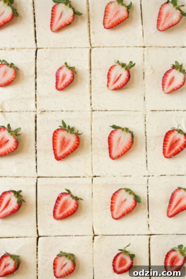 Texas-sized vanilla sheet cake with cream cheese frosting - a simple vanilla sheet cake with a sweet and tangy frosting! So good and feeds a crowd! #creamcheesefrosting #vanillasheetcake #texassheetcake #sheetcake | Littlespicejar.com Texas-sized vanilla sheet cake with cream cheese frosting - a simple vanilla sheet cake with a sweet and tangy frosting! So good and feeds a crowd! #creamcheesefrosting #vanillasheetcake #texassheetcake #sheetcake | Littlespicejar.com