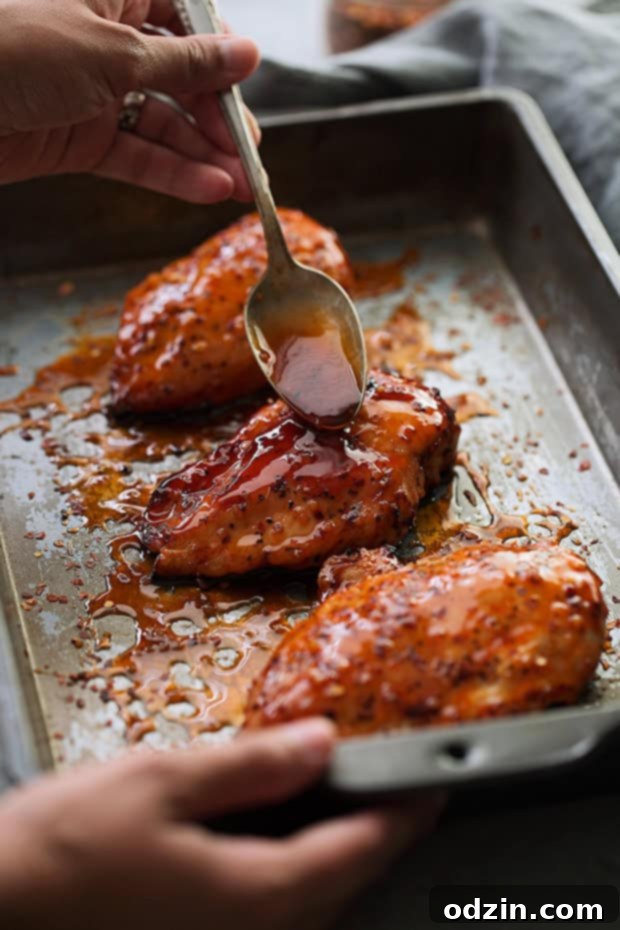 Baked Firecracker Chicken - A quick and easy weeknight dinner recipe! Learn how to make my dynamite firecracker sauce. Serve with rice! #bakedchicken #chicken #dinner #firecrackerchicken #firecrackersauce | Littlespicejar.com