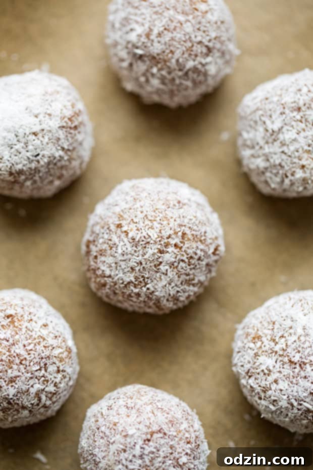 5-Ingredient Coconut Almond Energy Bites: Perfect Refined Sugar-Free Snack Delicious Coconut Almond Energy Bites, a healthy 5-ingredient snack with sweet, salty, and crunchy textures.