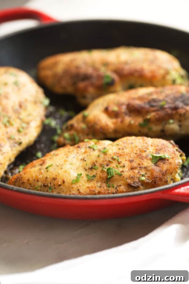 Sun-Dried Tomato and Spinach Stuffed Chicken Breasts - a simple yet elegant recipe for stuffed chicken breasts. Crispy on the outside and cheesy on the inside! #chicken #stuffedchicken #chickenrecipes | Littlespicejar.com