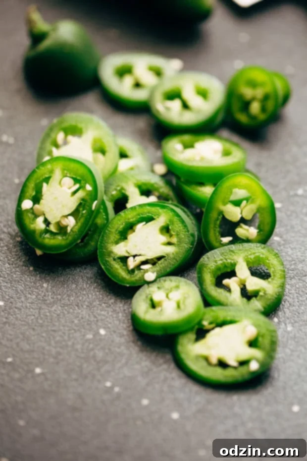 Jalapeno Salt and Pepper Shrimp - a close up of the perfectly cooked shrimp. #jalapenoshrimp #sauteedshrimp #shrimp #saltandpeppershrimp | Littlespicejar.com