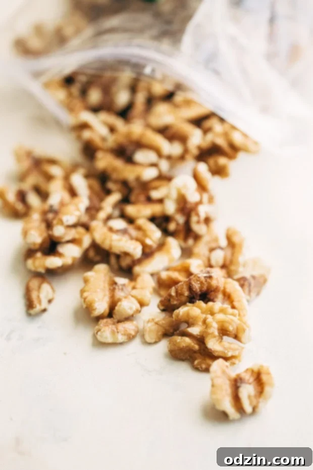 Cinnamon Apple Crumb Cake - A simple coffee cake topped with sliced apples and lots of jump lump crumbs. The perfect accompaniment to coffee of a crisp fall morning! #coffeecake #applecrumbcake #crumbcake | Littlespicejar.com Close-up of Cinnamon Apple Crumb Cake, highlighting the juicy apple slices and thick crumb topping.