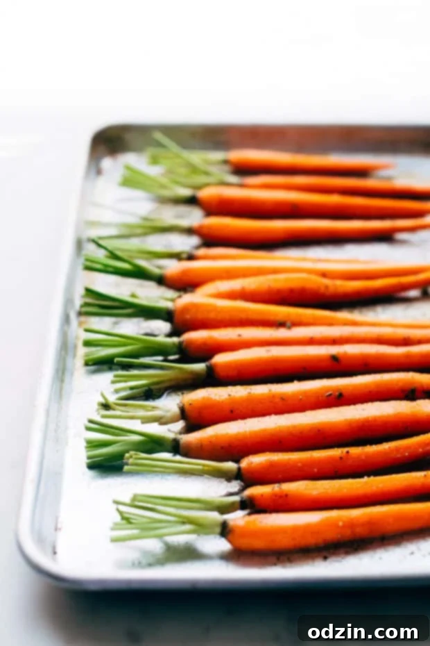 Ingredients for brown butter honey glaze: melted brown butter, honey, garlic powder, salt, pepper, and fresh thyme, ready to be mixed.