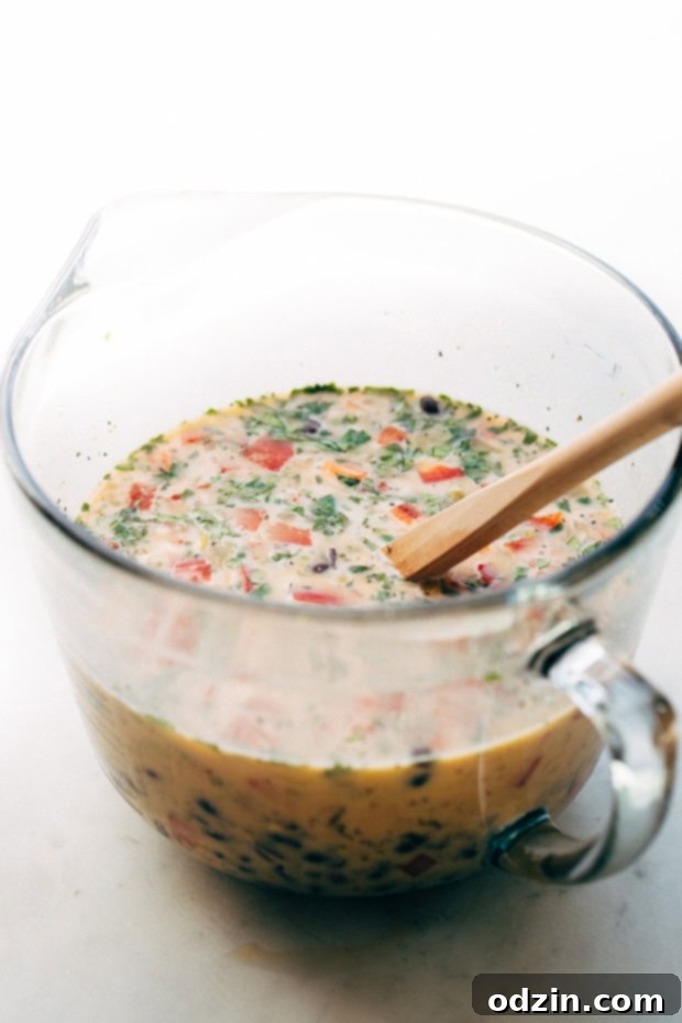 Mexican Breakfast Casserole with Hash Brown Crust - an easy casserole that feeds a crowd! You can even stuff it inside warm tortillas and make breakfast tacos! #breakfastcasserole #mexicanbreakfastcasserole #breakfasttacos | Littlespicejar.com Mexican Breakfast Casserole with Hash Brown Crust - an easy casserole that feeds a crowd! You can even stuff it inside warm tortillas and make breakfast tacos! #breakfastcasserole #mexicanbreakfastcasserole #breakfasttacos | Littlespicejar.com